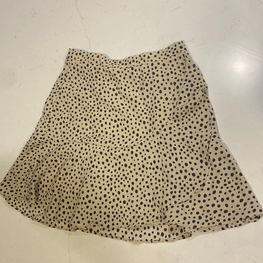 Francesca’s cheetah print skirt.